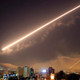 Damascus skies erupt with surface to air missile fire as the U.S. launches an attack on Syria targeting different parts of the Syrian capital Damascus, Syria, early Saturday, April 14, 2018. Syria's capital has been rocked by loud explosions that lit up the sky with heavy smoke as U.S. President Donald Trump announced airstrikes in retaliation for the country's alleged use of chemical weapons.
